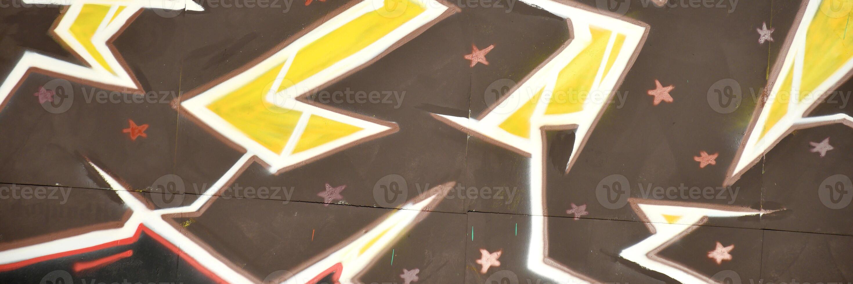 Colorful background of graffiti painting artwork with bright aerosol outlines on wall. Old school street art piece made with aerosol spray paint cans. Contemporary youth culture photo