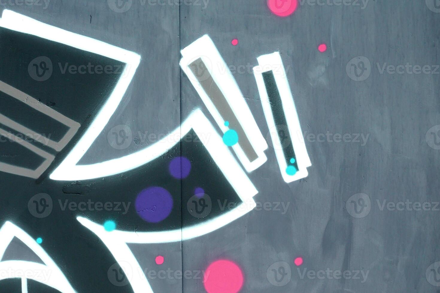 Colorful background of graffiti painting artwork with bright aerosol outlines on wall. Old school street art piece made with aerosol spray paint cans. Contemporary youth culture photo
