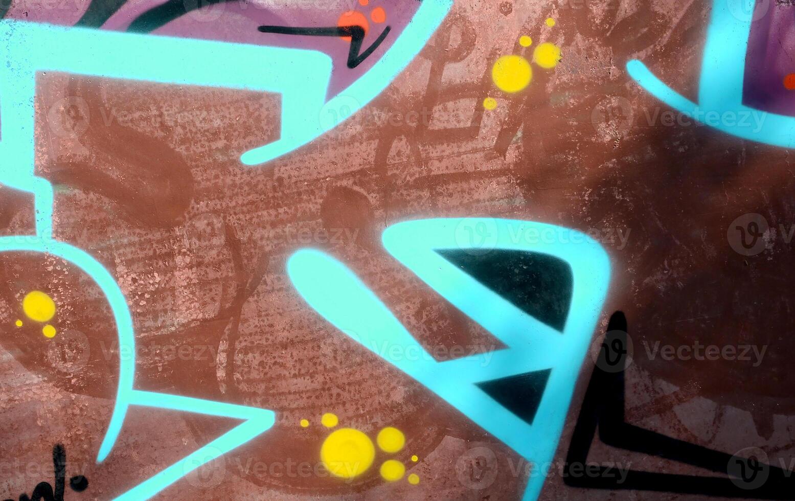 Colorful background of graffiti painting artwork with bright aerosol outlines on wall. Old school street art piece made with aerosol spray paint cans. Contemporary youth culture photo