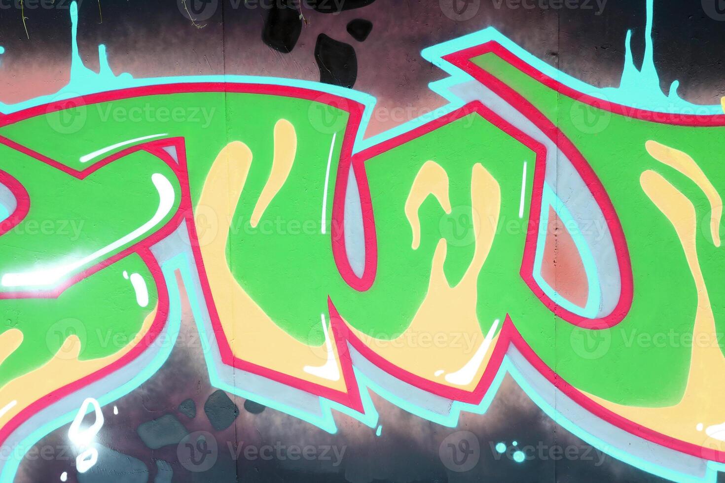 Colorful background of graffiti painting artwork with bright aerosol outlines on wall. Old school street art piece made with aerosol spray paint cans. Contemporary youth culture photo
