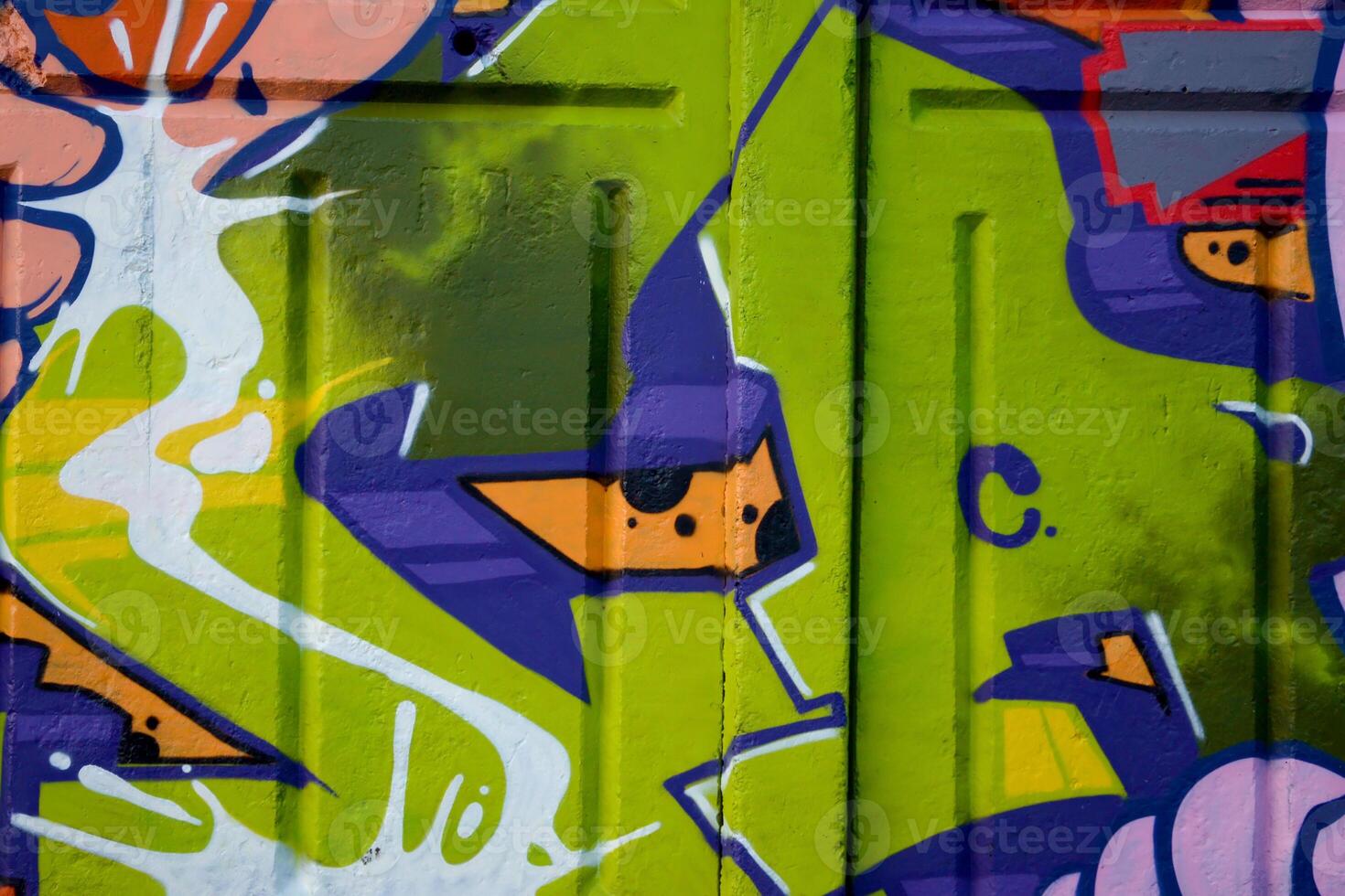 Colorful background of graffiti painting artwork with bright aerosol outlines on wall. Old school street art piece made with aerosol spray paint cans. Contemporary youth culture photo