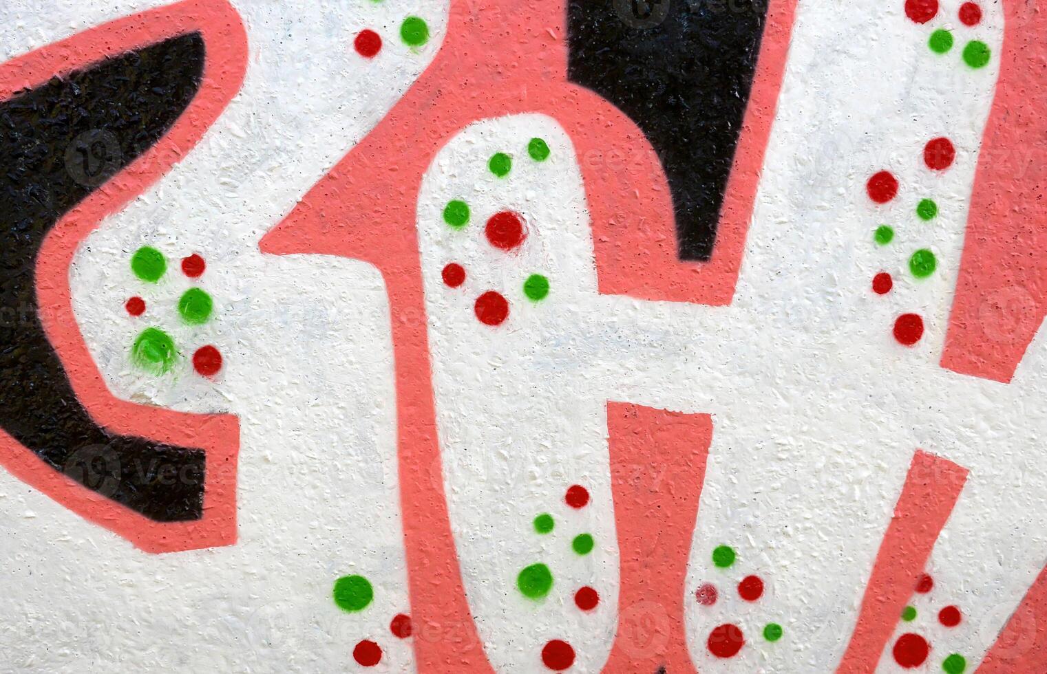 Colorful background of graffiti painting artwork with bright aerosol outlines on wall. Old school street art piece made with aerosol spray paint cans. Contemporary youth culture photo