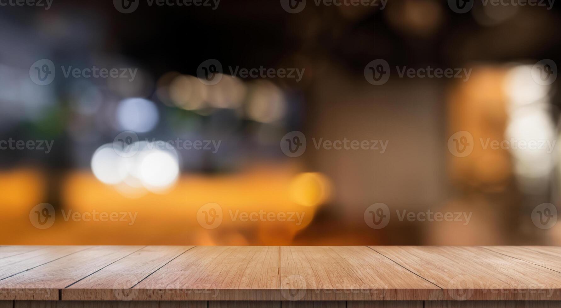 Empty Wooden Table with Bokeh Lights in Blurred Restaurant photo