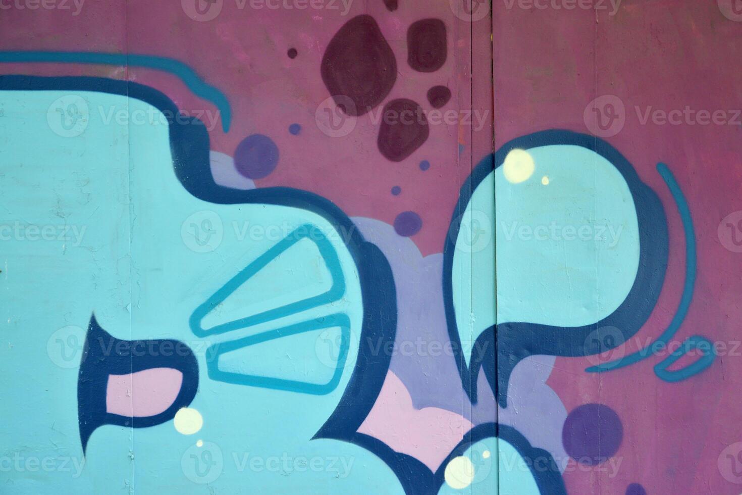 Colorful background of graffiti painting artwork with bright aerosol outlines on wall. Old school street art piece made with aerosol spray paint cans. Contemporary youth culture photo