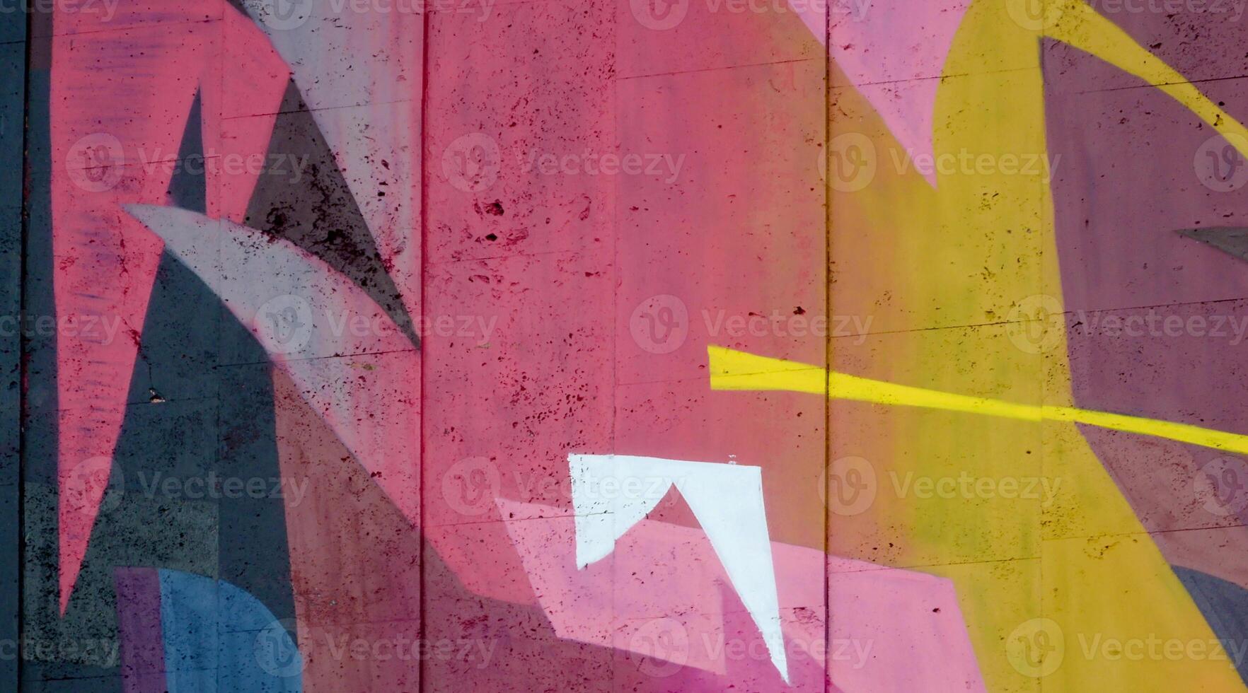 Colorful background of graffiti painting artwork with bright aerosol outlines on wall. Old school street art piece made with aerosol spray paint cans. Contemporary youth culture photo
