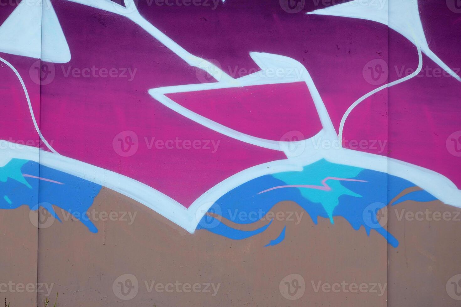 Colorful background of graffiti painting artwork with bright aerosol outlines on wall. Old school street art piece made with aerosol spray paint cans. Contemporary youth culture photo