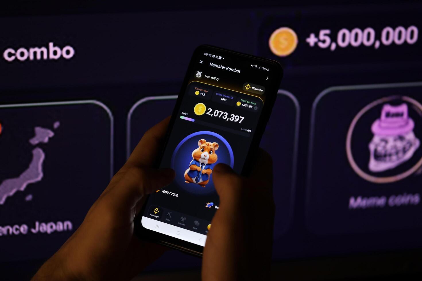KYIV, UKRAINE - APRIL 20, 2024 Hamster Kombat telegram bot on smartphone screen. Hamster Kombat is a viral Telegram-based crypto game for earn HMSTR tokens by managing virtual crypto exchange photo