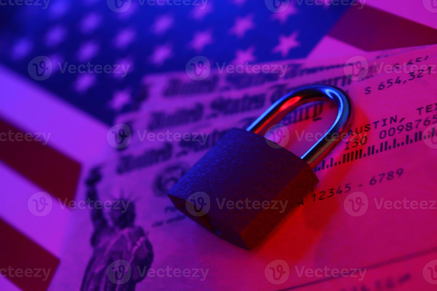 United States Treasury refund check or stimulus bill with small padlock on US Flag photo