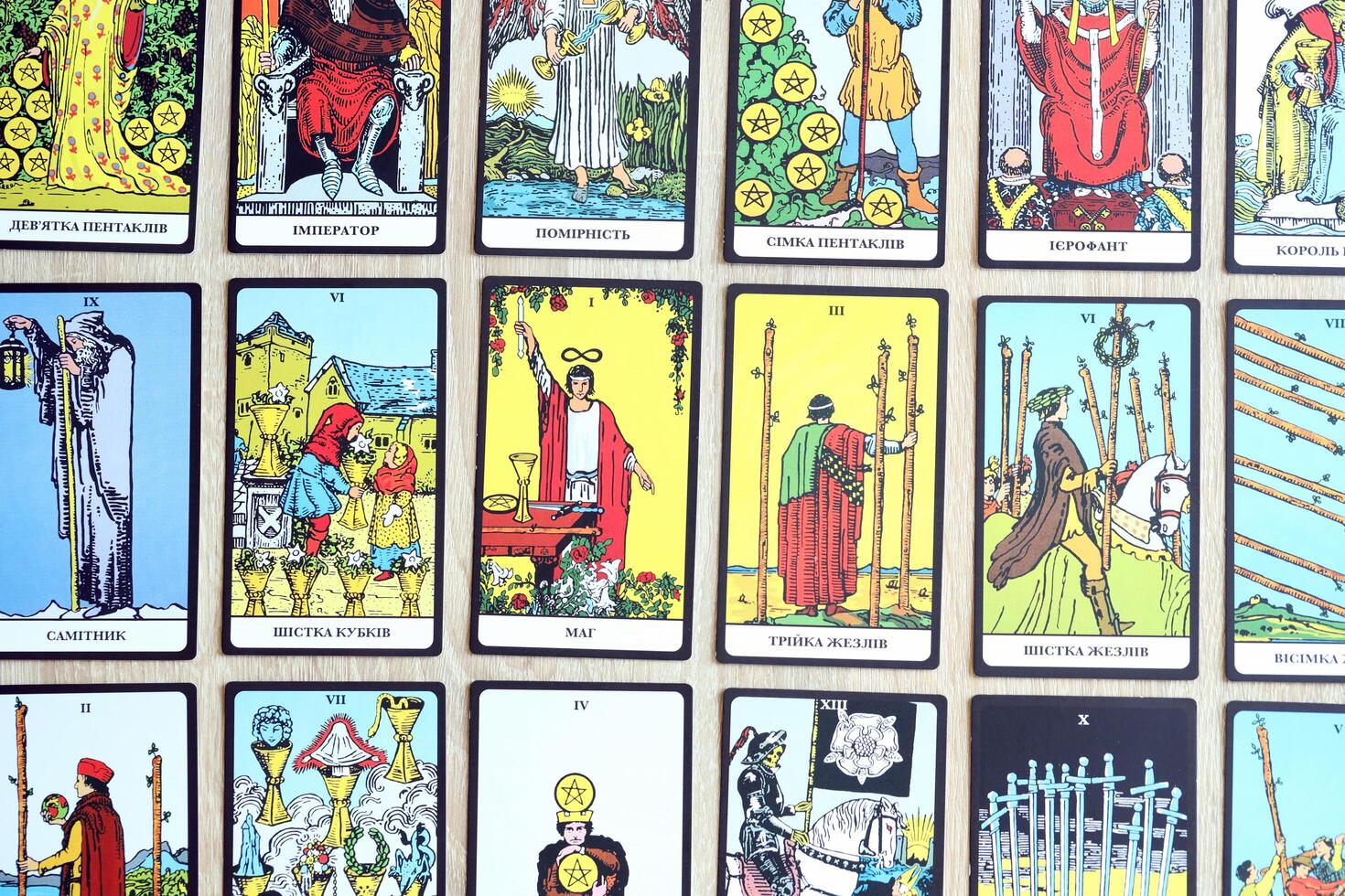KYIV, UKRAINE - JULY 10, 2024 Tarot minor and major arcana cards of Rider Waite esoteric deck. Many tarot cards for fortune telling and esoteric actions photo
