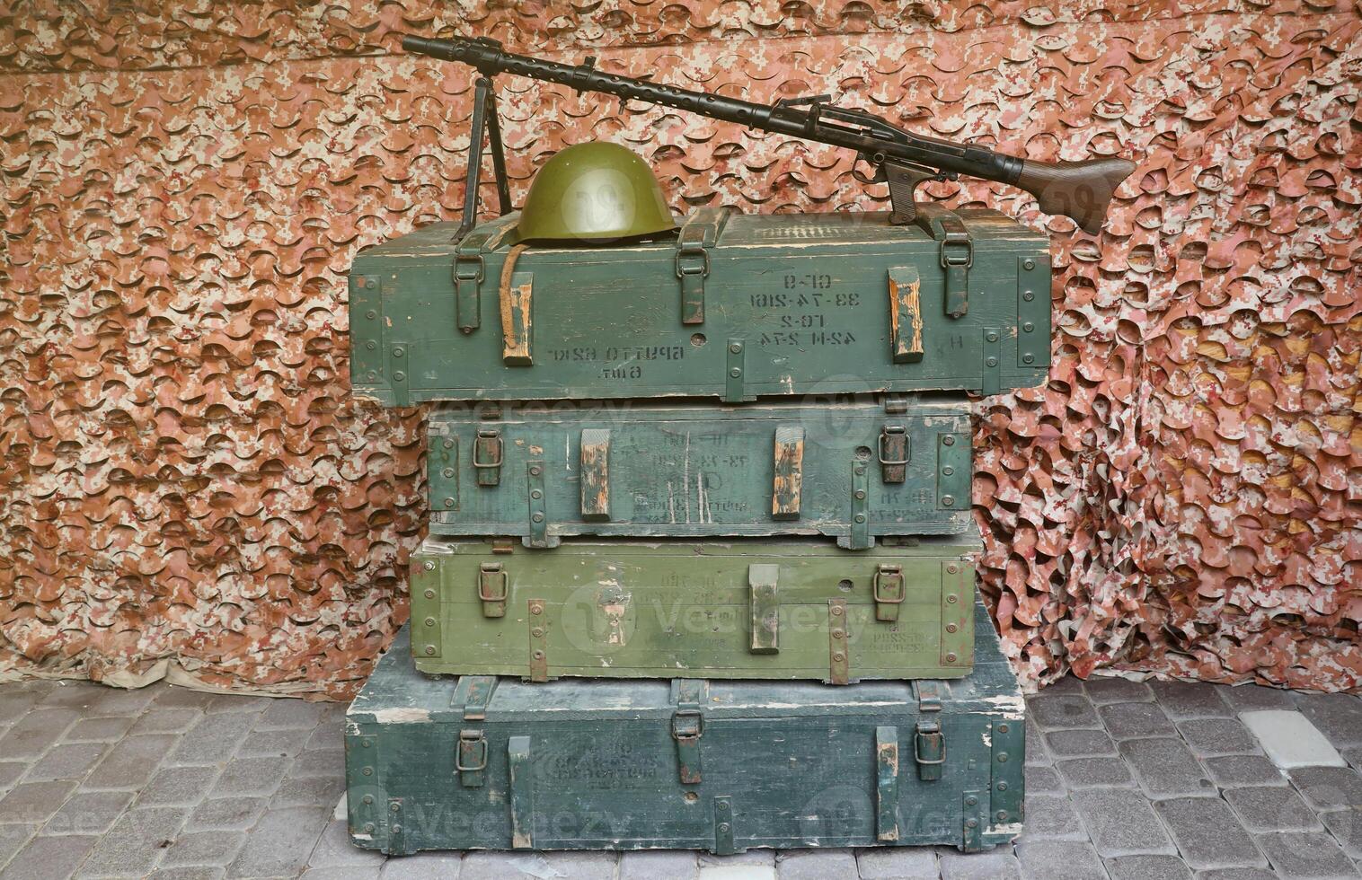Soviet army ammunition stack of green crates with russian names of ammo type and category photo