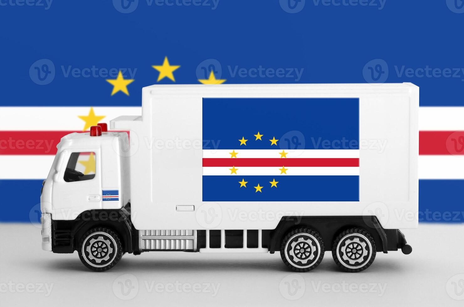 Cabo verde flag depicted on side wall of white delivery van. Shipping and local delivery concept photo