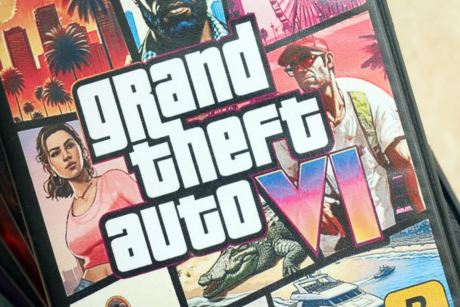 KYIV, UKRAINE - JUNE 26, 2024 Grand Theft Auto 6 PS5 game disc box for console gaming. Fictional fan-made game disc pack cover photo