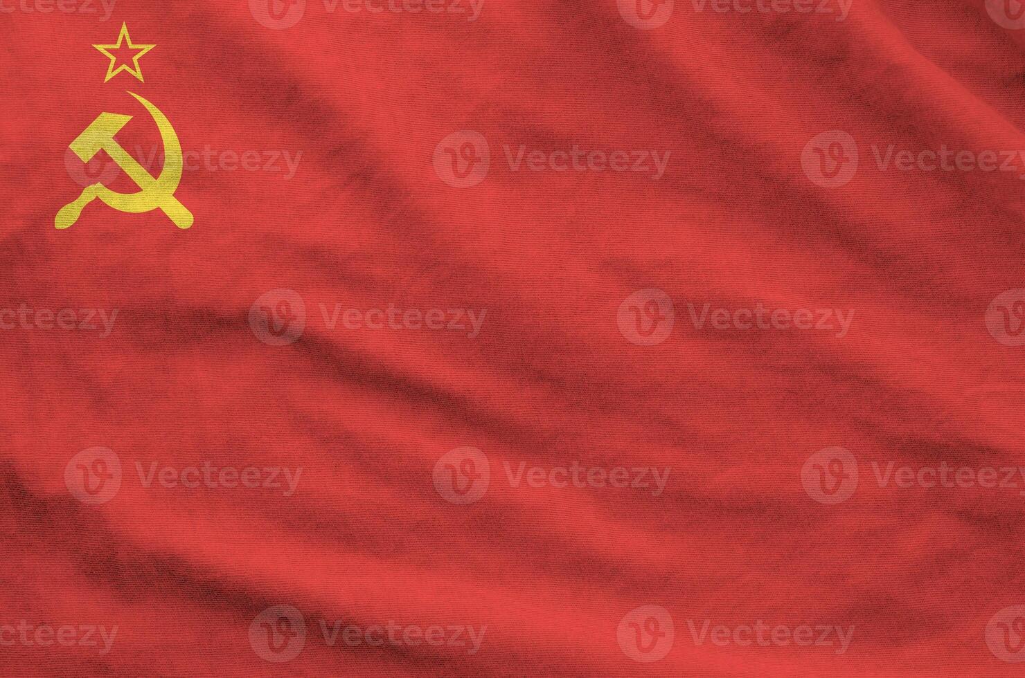 Soviet Union flag depicted on folded wavy fabric of old cloth photo