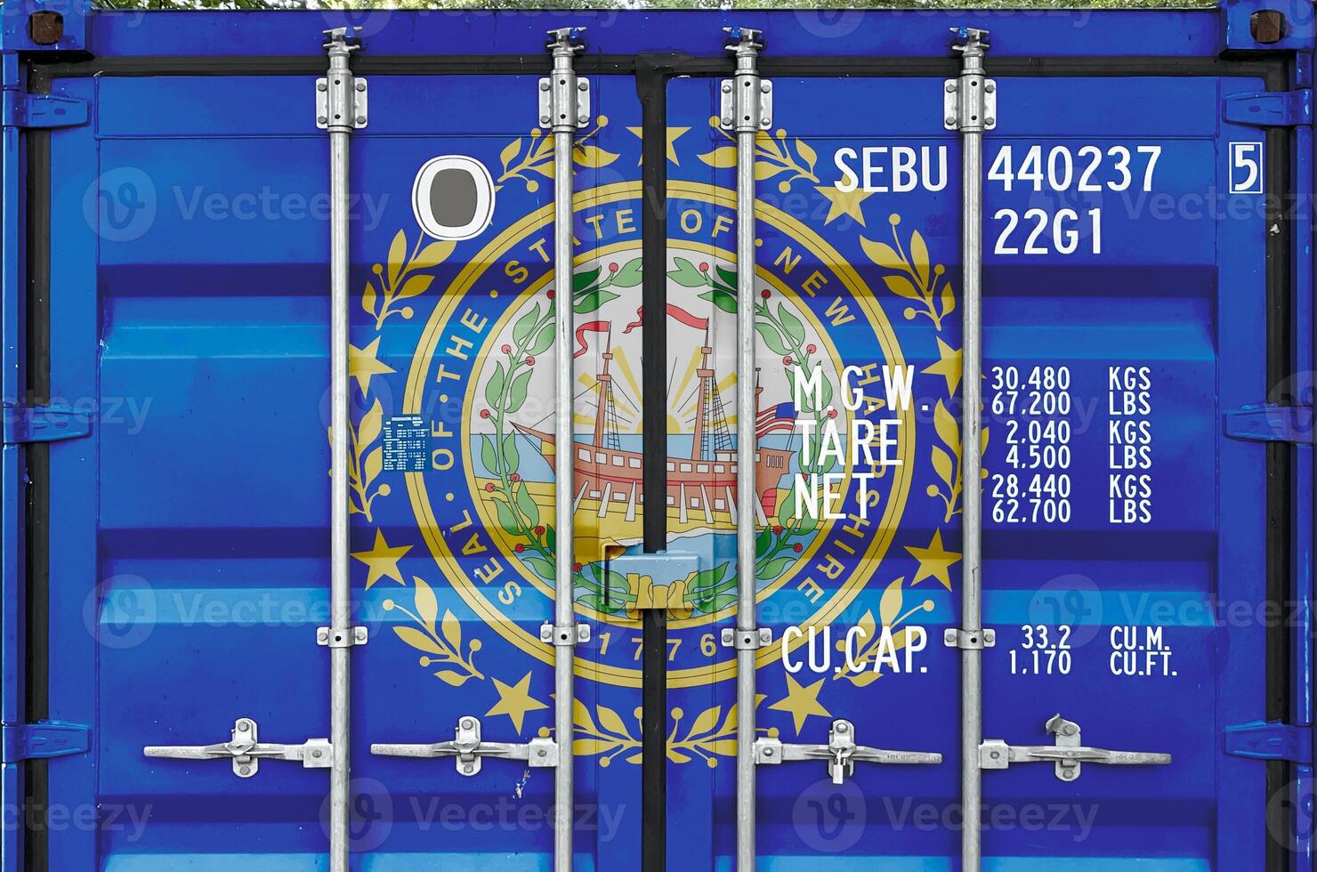 New Hampshire US state flag depicted on metal doors of shipping cargo container outdoors in docks area photo