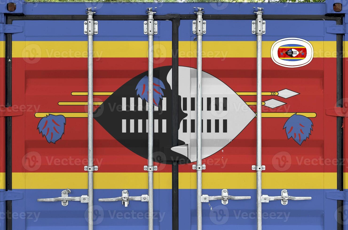 Swaziland flag depicted on metal doors of shipping cargo container outdoors in docks area photo