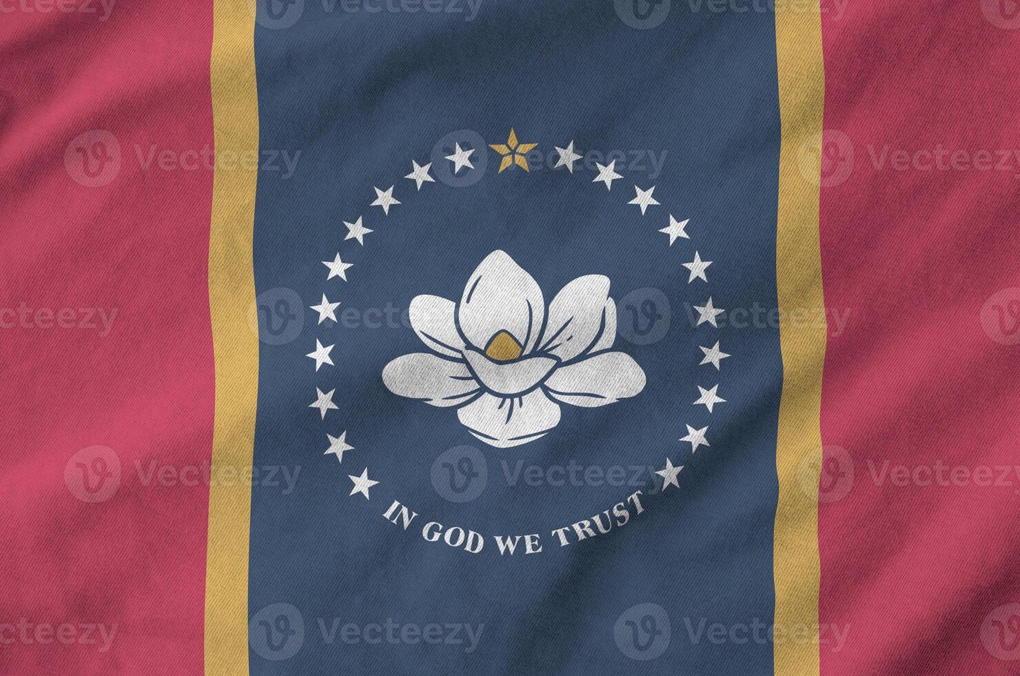 Mississippi new US state flag depicted on folded wavy fabric of old cloth photo