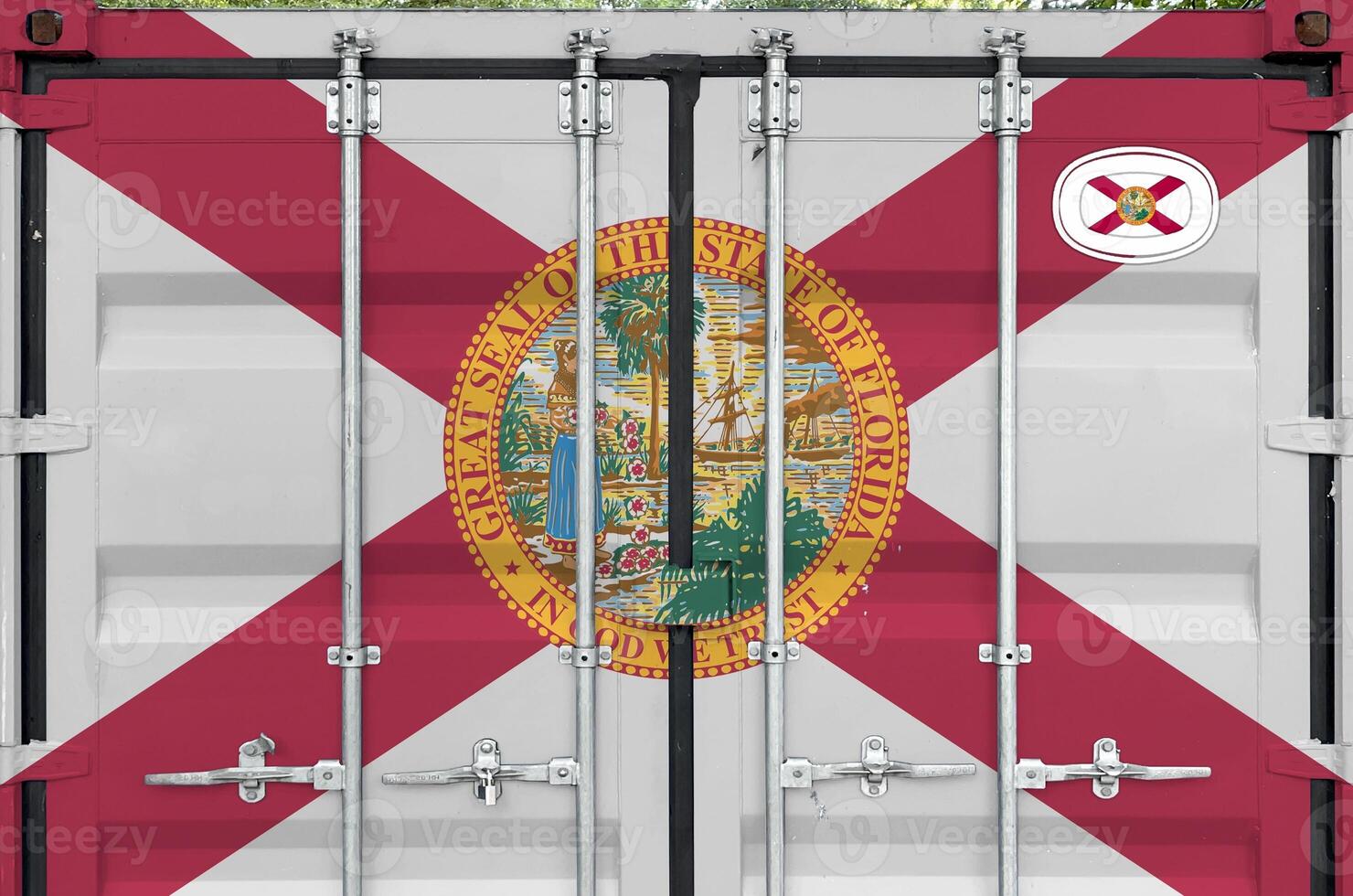 Florida US state flag depicted on metal doors of shipping cargo container outdoors in docks area photo
