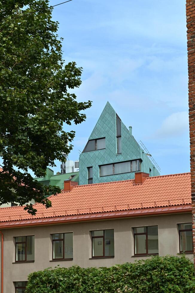 a building with a triangular roof photo