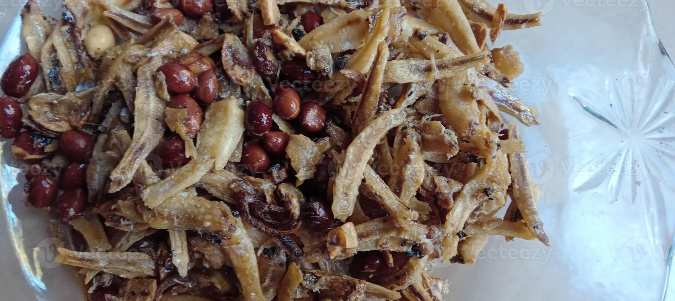 Fried salted anchovies with peanuts photo