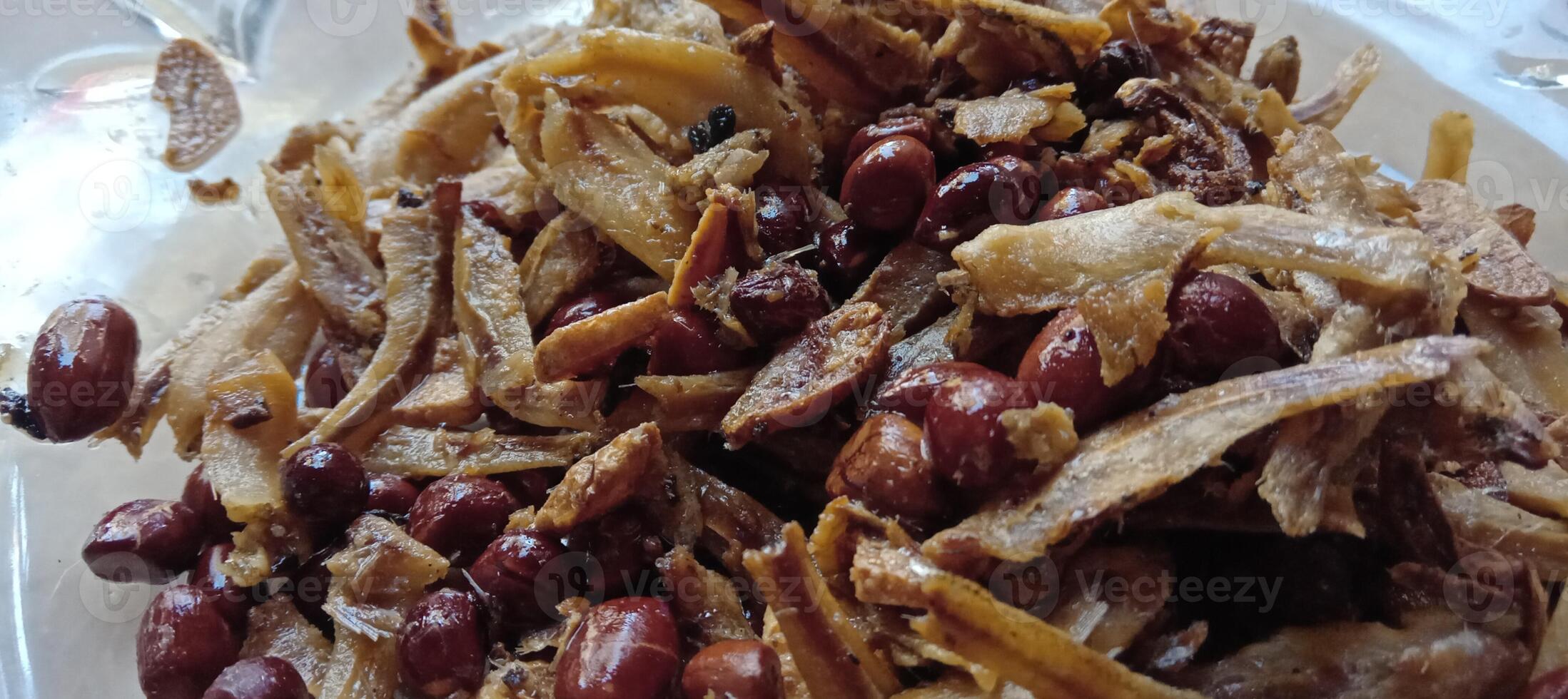 Fried salted anchovies with peanuts photo