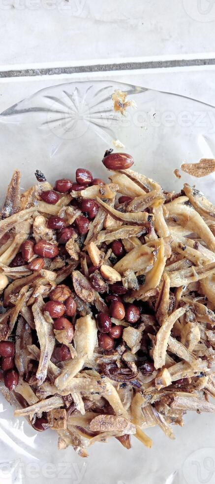 Fried salted anchovies with peanuts photo