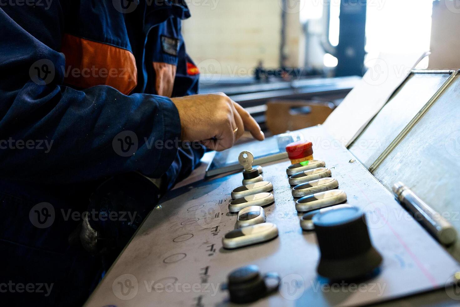 Machine controle panel buttons in the metal factory photo