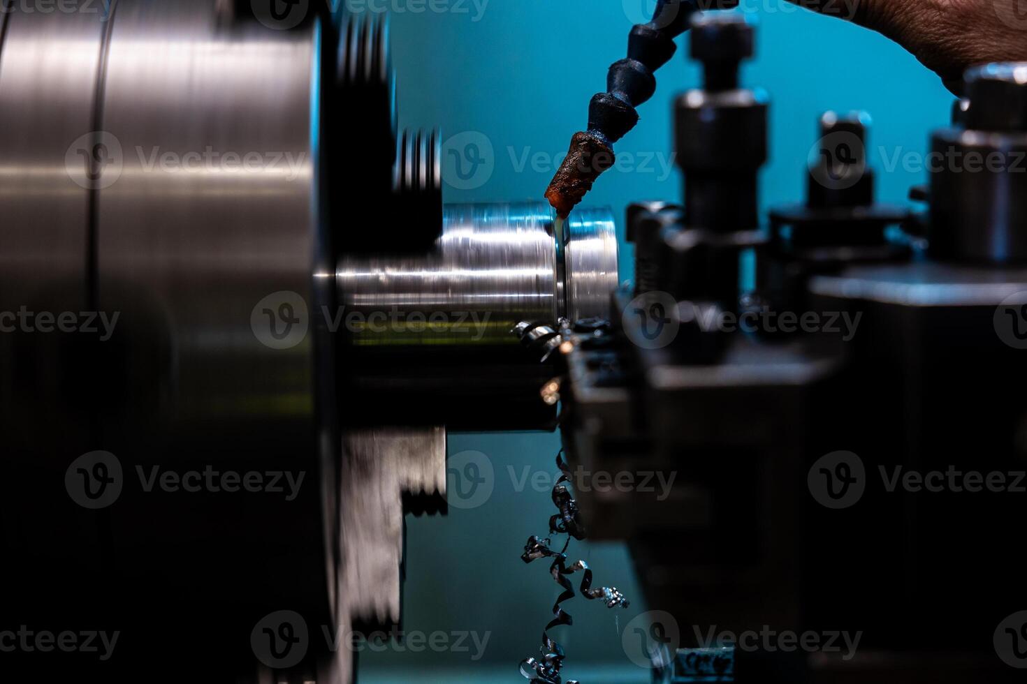 The CNC lathe machine thread cutting at the end of metal cone shape parts The hi technology metal working processing by CNC turning machine photo