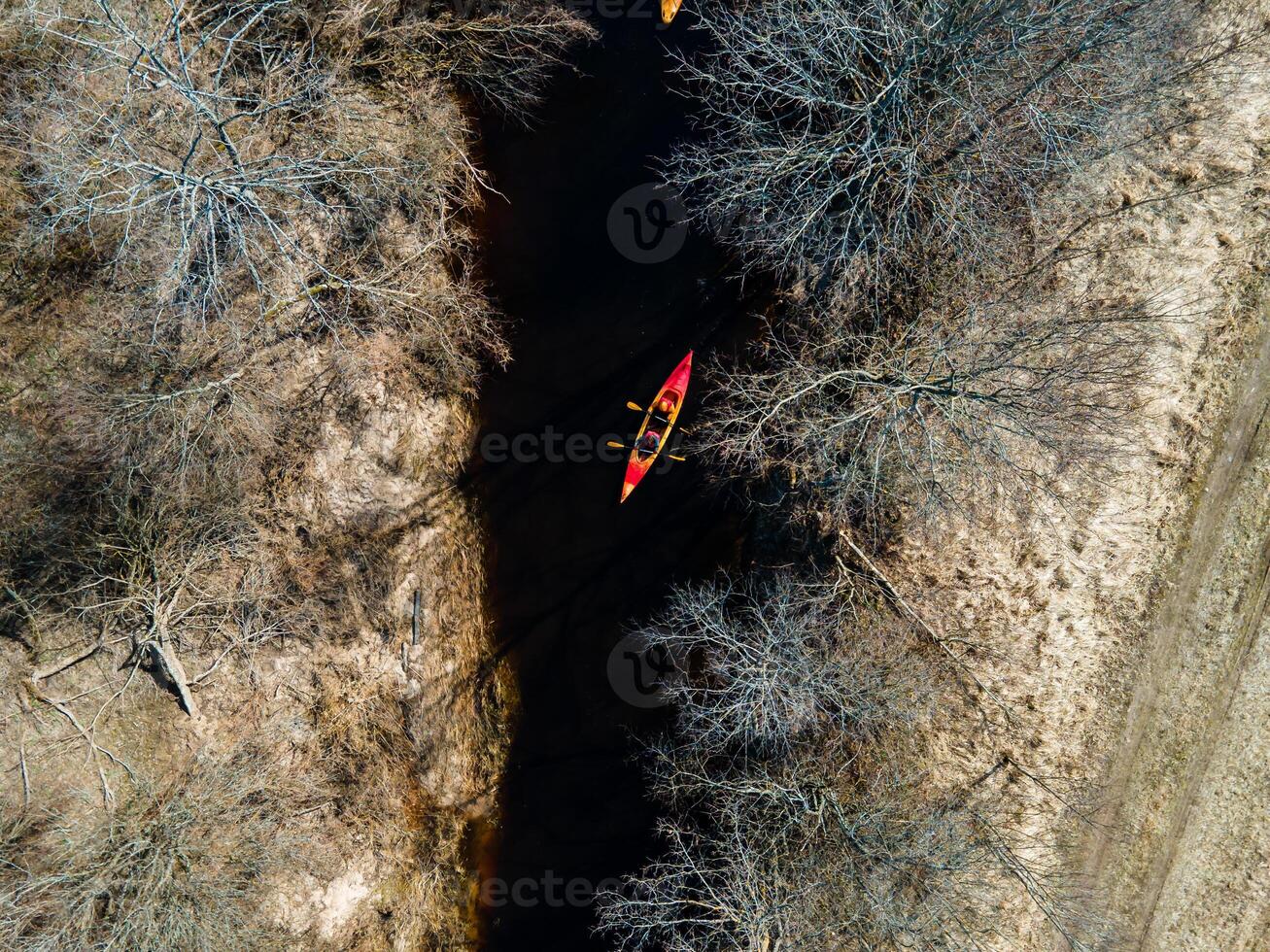 Kayaking on river early spring, view from above photo