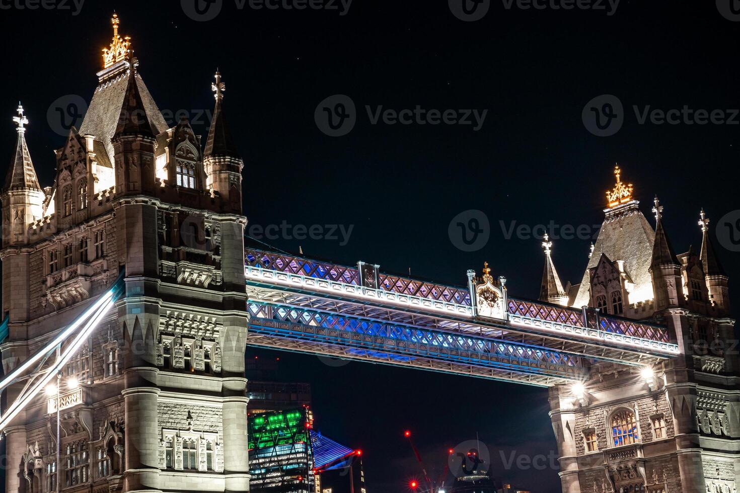 Close up of London Tower Bridge at Night. One of London's most famous bridges and must see landmarks in London. photo