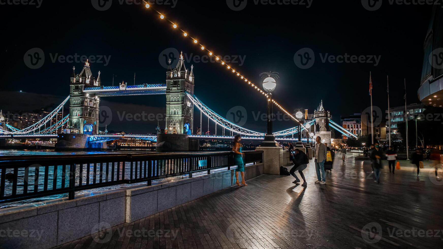 London Tower Bridge at Night in United Kingdom. One of London's most famous bridges and must see landmarks in England photo