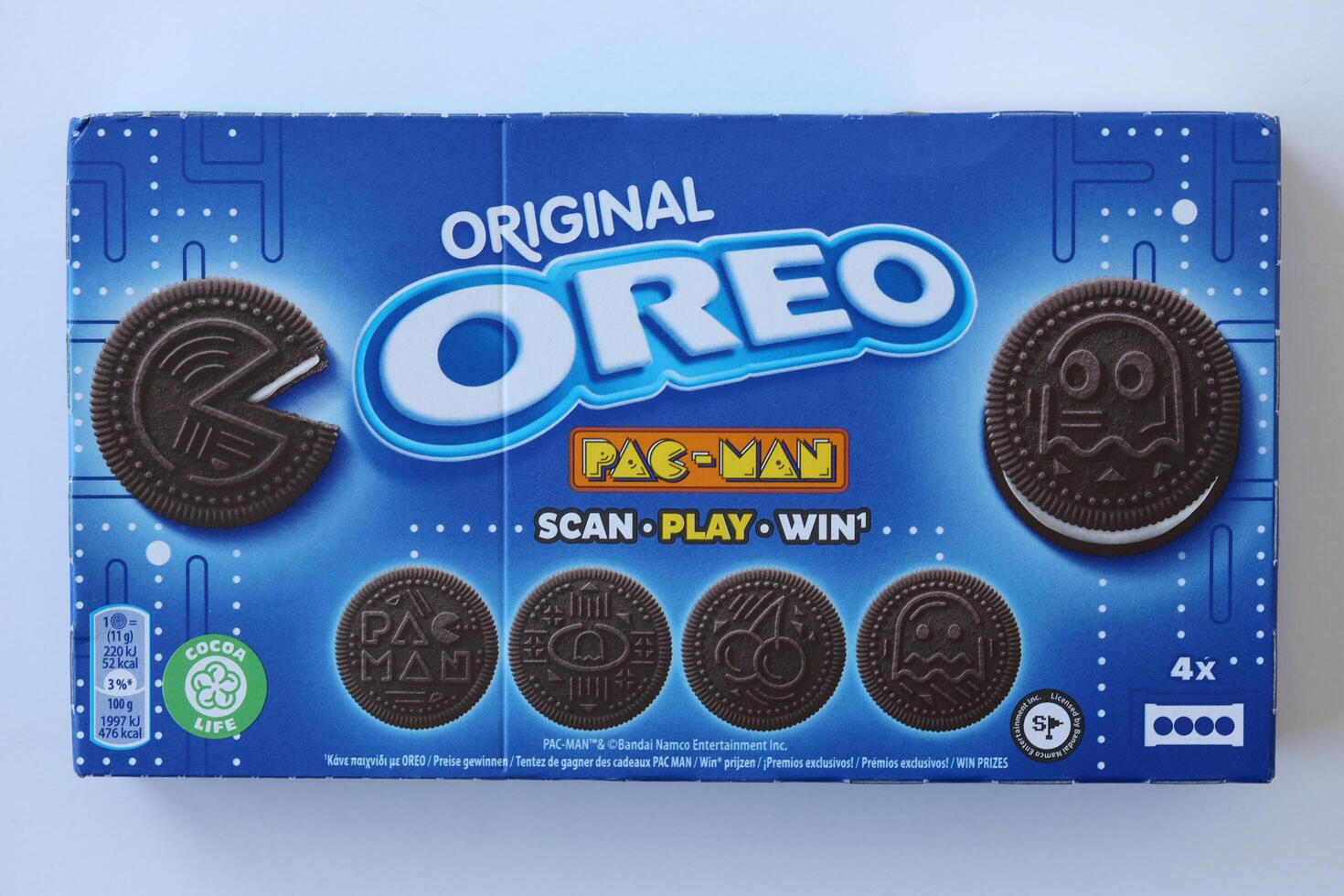 KYIV, UKRAINE - APRIL 20, 2024 Oreo pac-man crispy cookies packs. The brand Oreo owned by american company Mondelez international photo