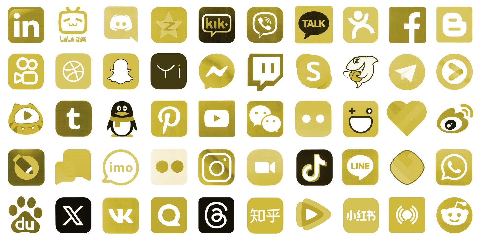 KYIV, UKRAINE - APRIL 1, 2024 Many icons of social media, messengers, sharing platforms photo