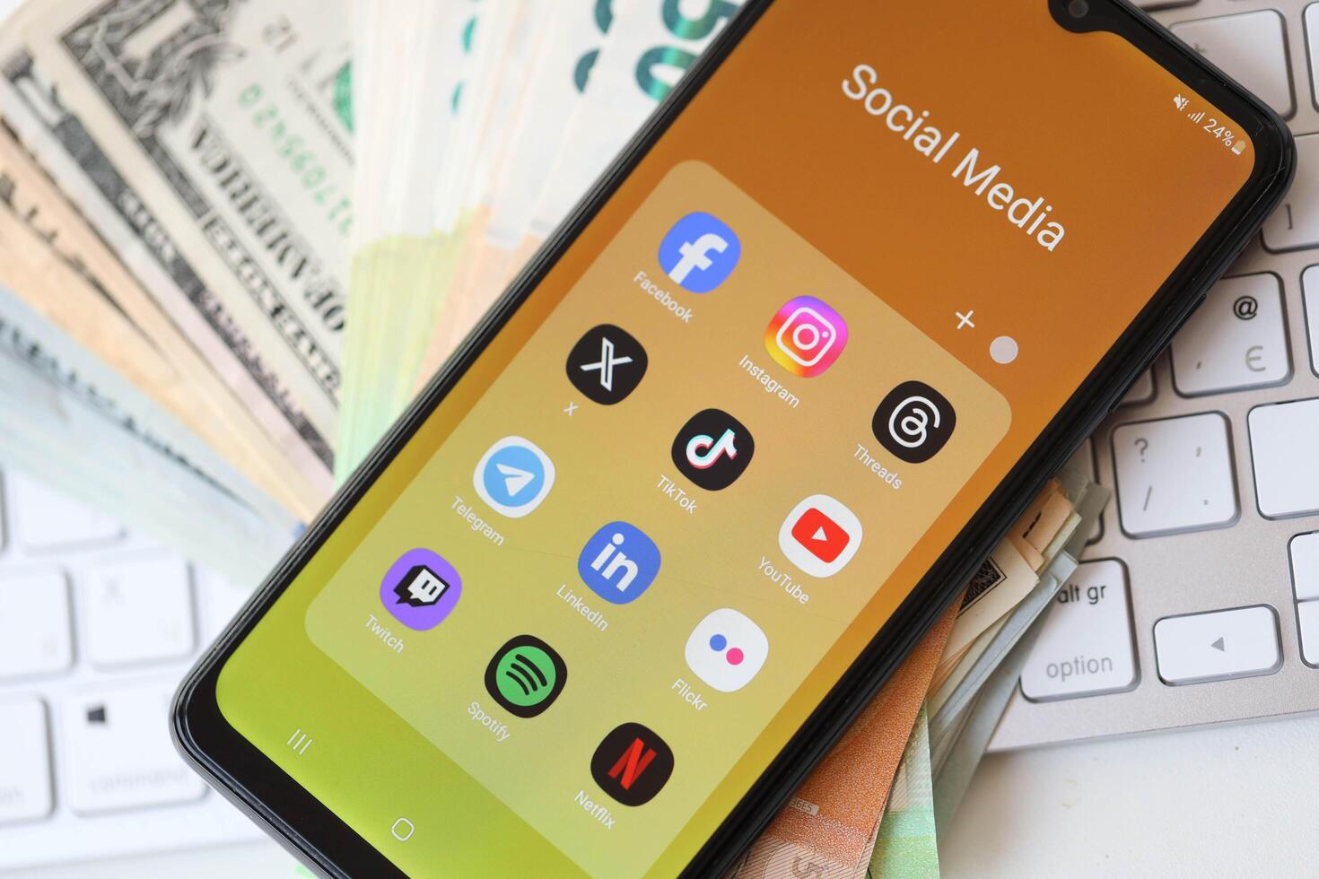 KYIV, UKRAINE - FEBRUARY 28, 2024 Social Media icons group on Galaxy A04s smartphone display photo