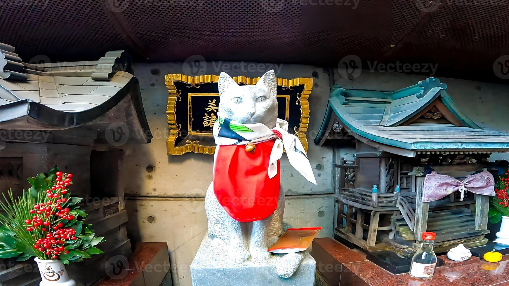 Inari where cats are enshrined. Mikii Inari, located in Akasaka, Minato-ku, Tokyo, Japan.Cats that people owned saved their owners when they were alive, and became cat gods that protected people even photo