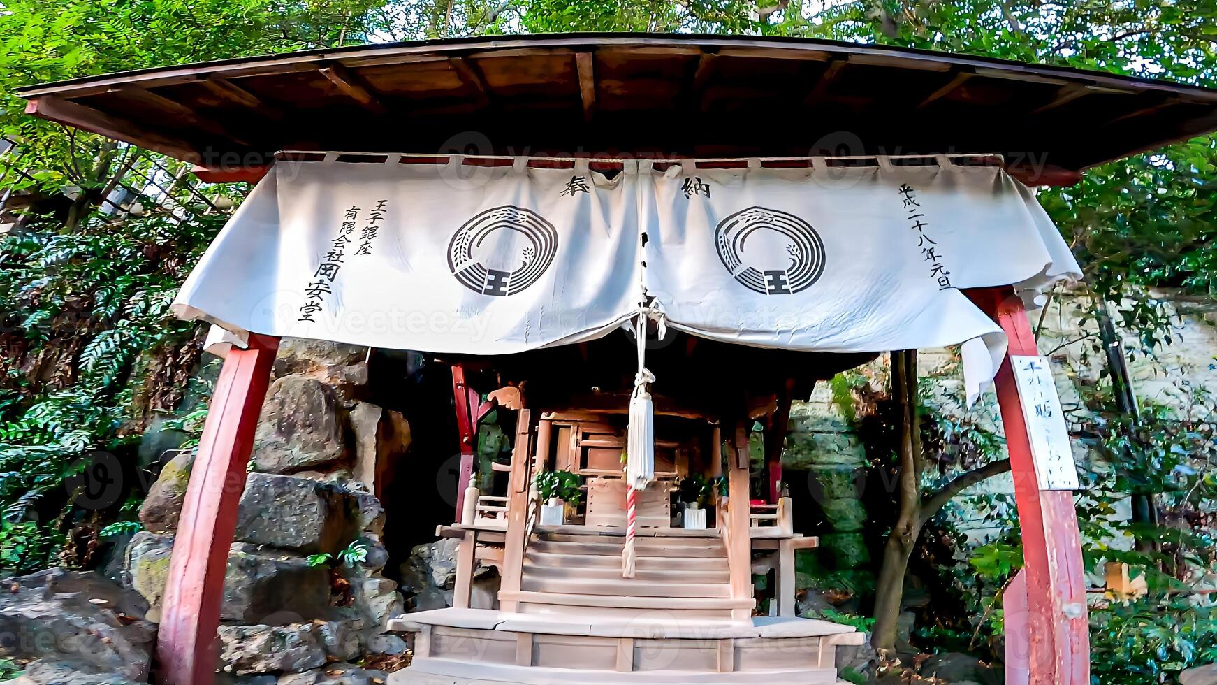 A small wooden shrine in the precincts of Oji Inari Shrine.Oji Inari Shrine is a shrine in Kishi-cho, Kita-ku, Tokyo. During the Kohei year photo