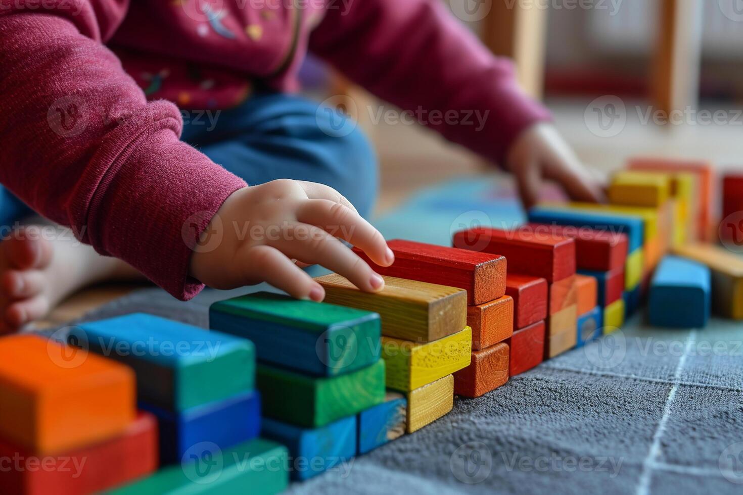 Kid with game at classroom. Children are playing with colorful building blocks in kindergarten. photo