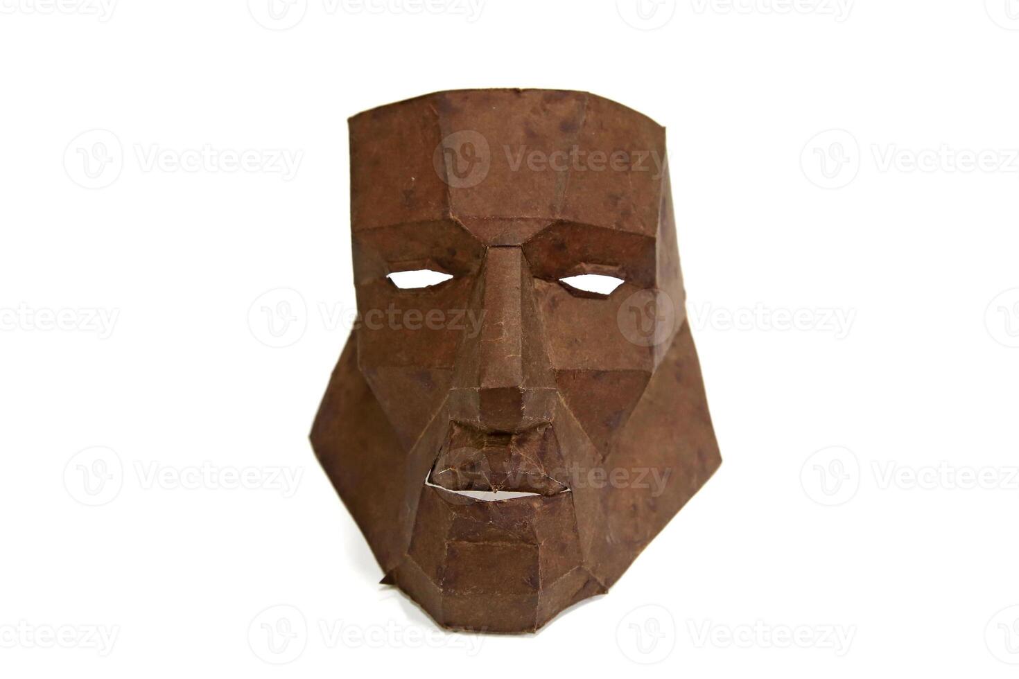 cardboard mask on white background photo