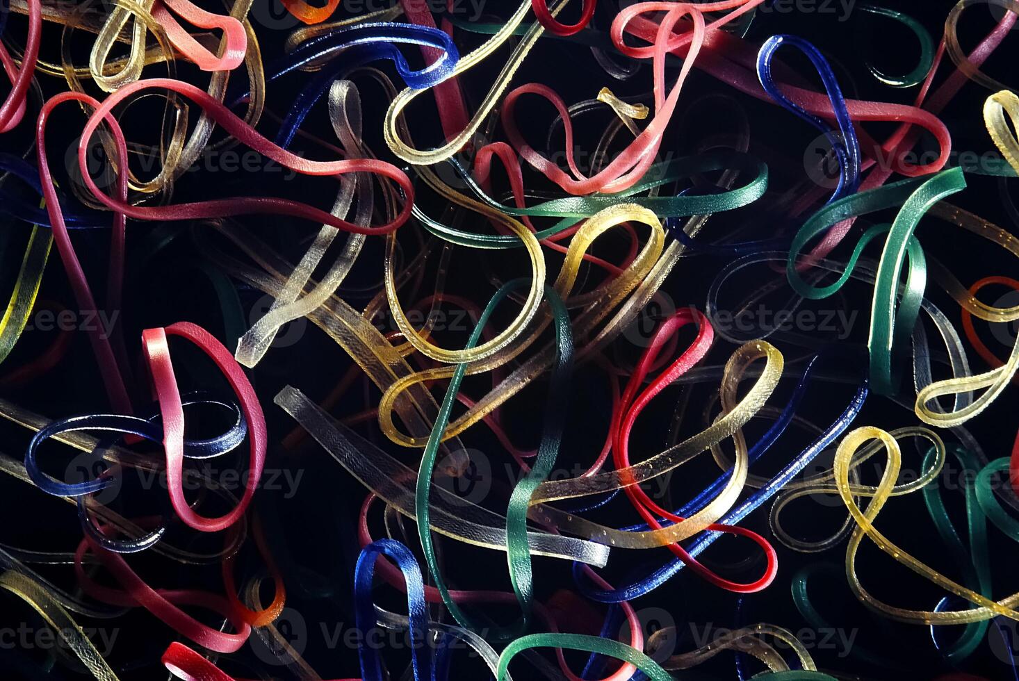 colorful elastics close-up seen from above photo
