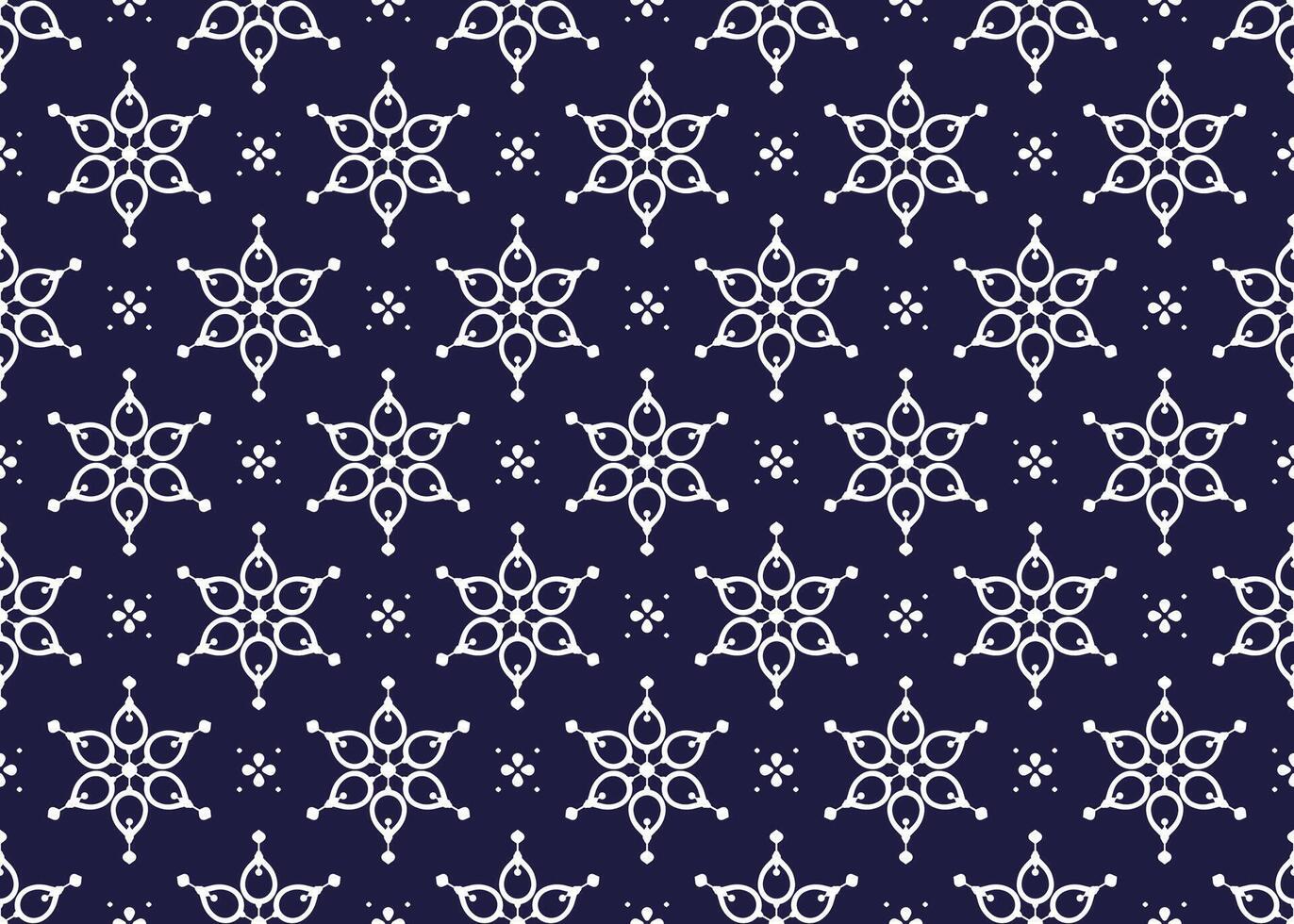 White symbol floral on dark blue background, ethnic fabric seamless pattern design for cloth, carpet, batik, wallpaper, wrapping etc. vector