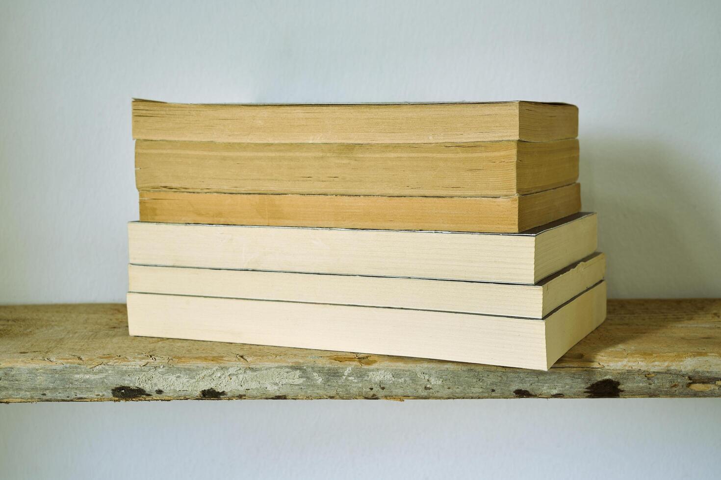 old books on a shelf photo