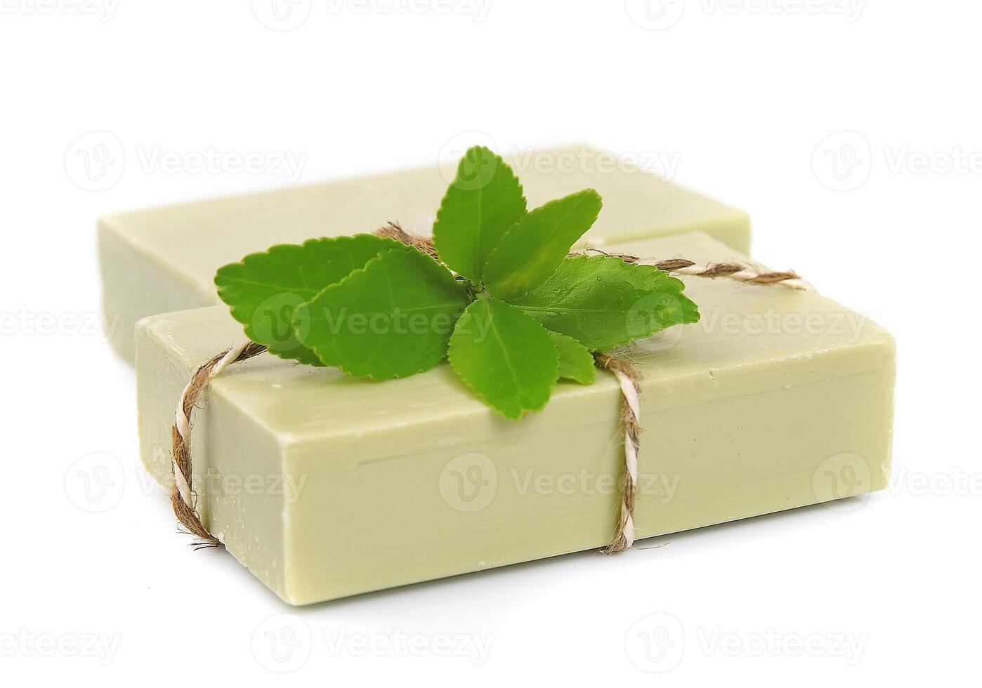 Soap and leaves of green tea photo