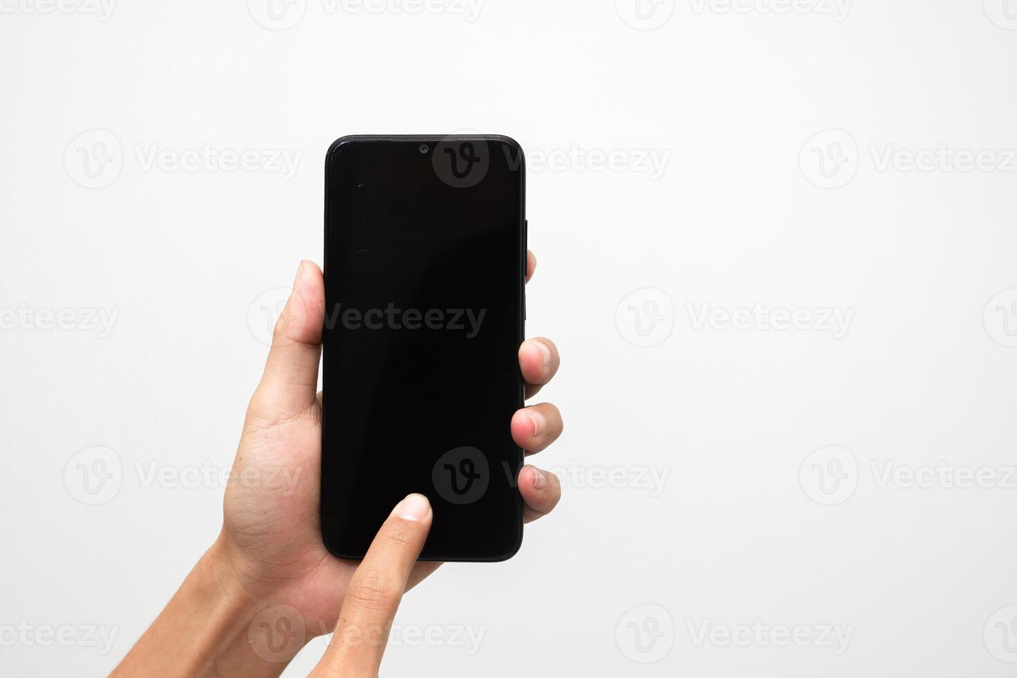 Man's hand holding a smart phone screen view from above. isolated in white background photo