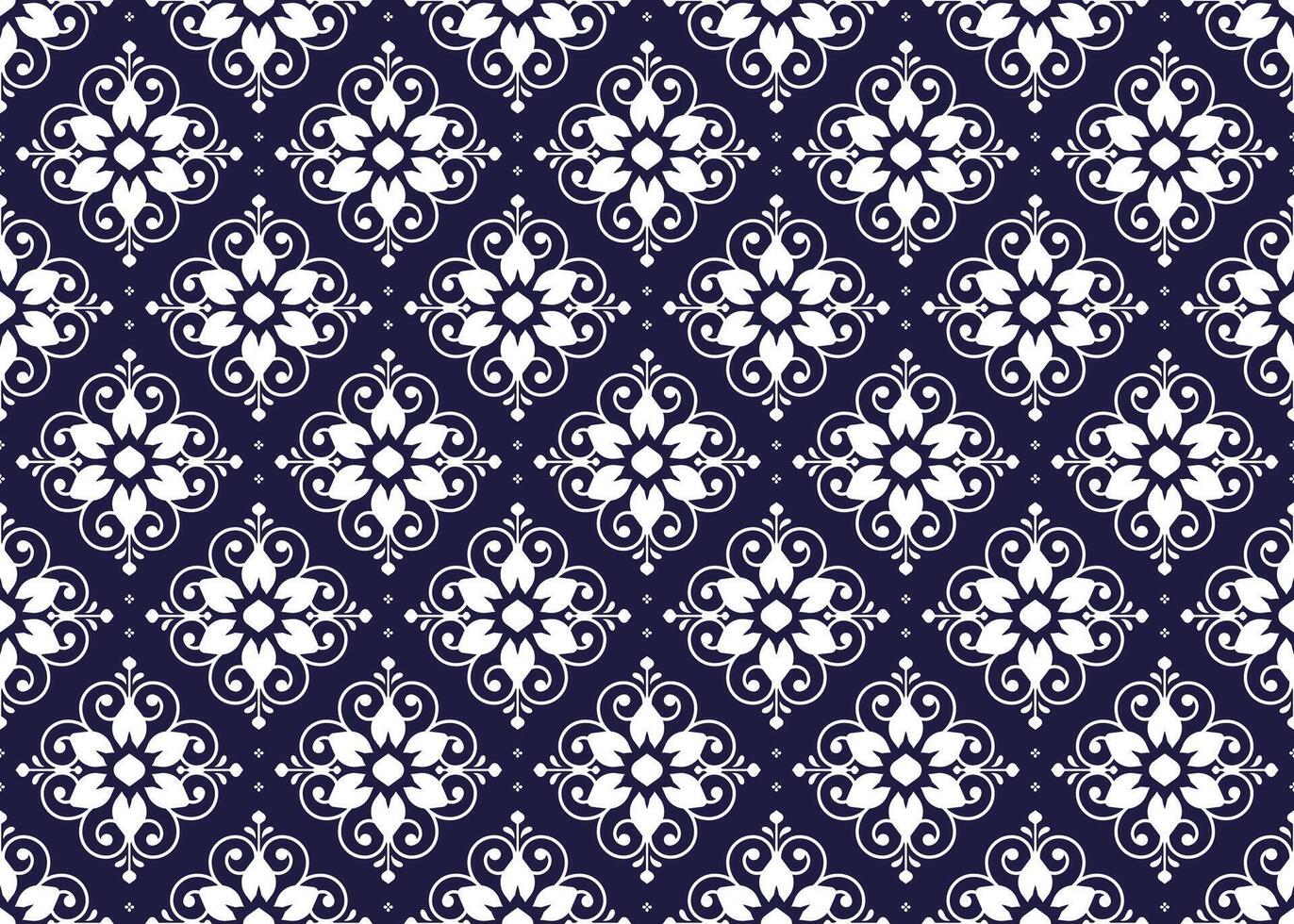 White symbol floral on dark blue background, ethnic fabric seamless pattern design for cloth, carpet, batik, wallpaper, wrapping etc. vector