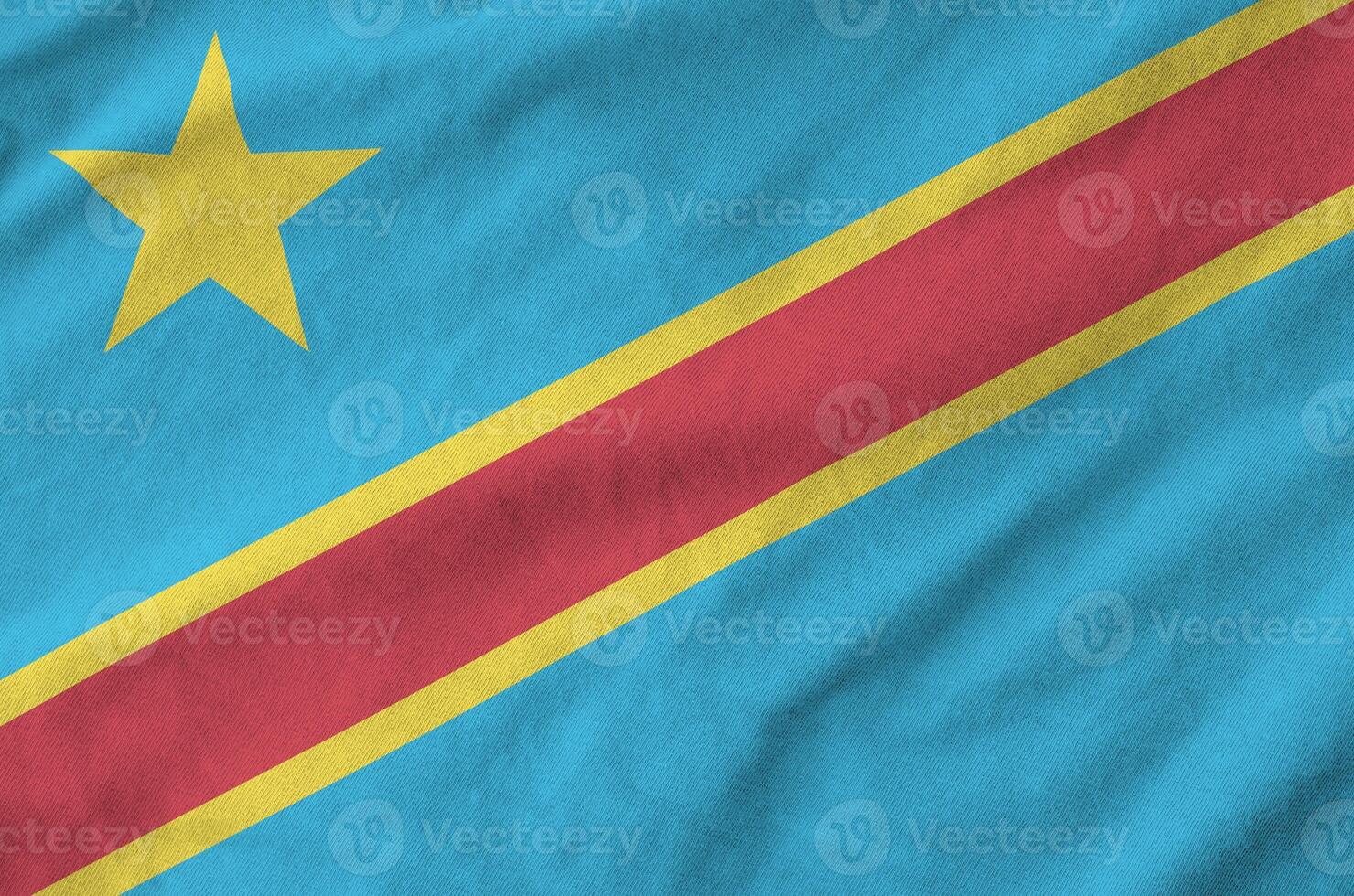 Democratic Republic of the Congo flag depicted on folded wavy fabric of old cloth photo