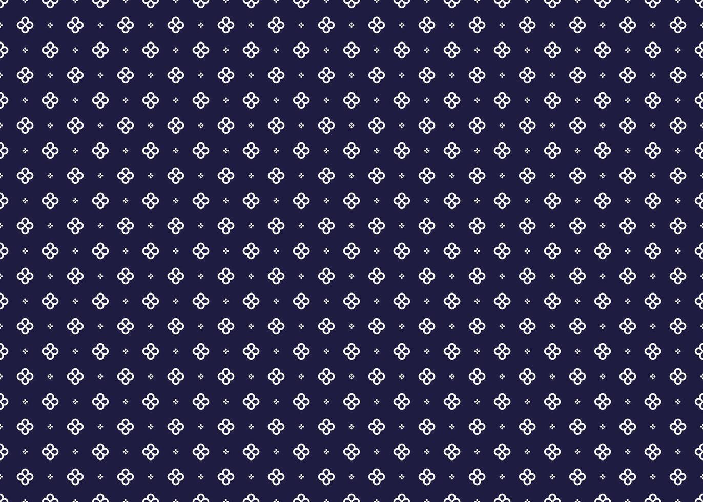 White symbol floral on dark blue background, ethnic fabric seamless pattern, design for cloth, carpet, batik, wallpaper, wrapping etc. vector