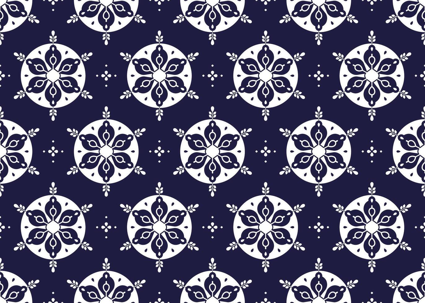 White symbol floral on dark blue background, ethnic fabric seamless pattern design for cloth, carpet, batik, wallpaper, wrapping etc. vector
