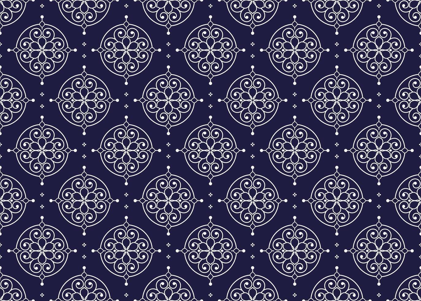 White symbol floral on dark blue background, ethnic fabric seamless pattern design for cloth, carpet, batik, wallpaper, wrapping etc. vector