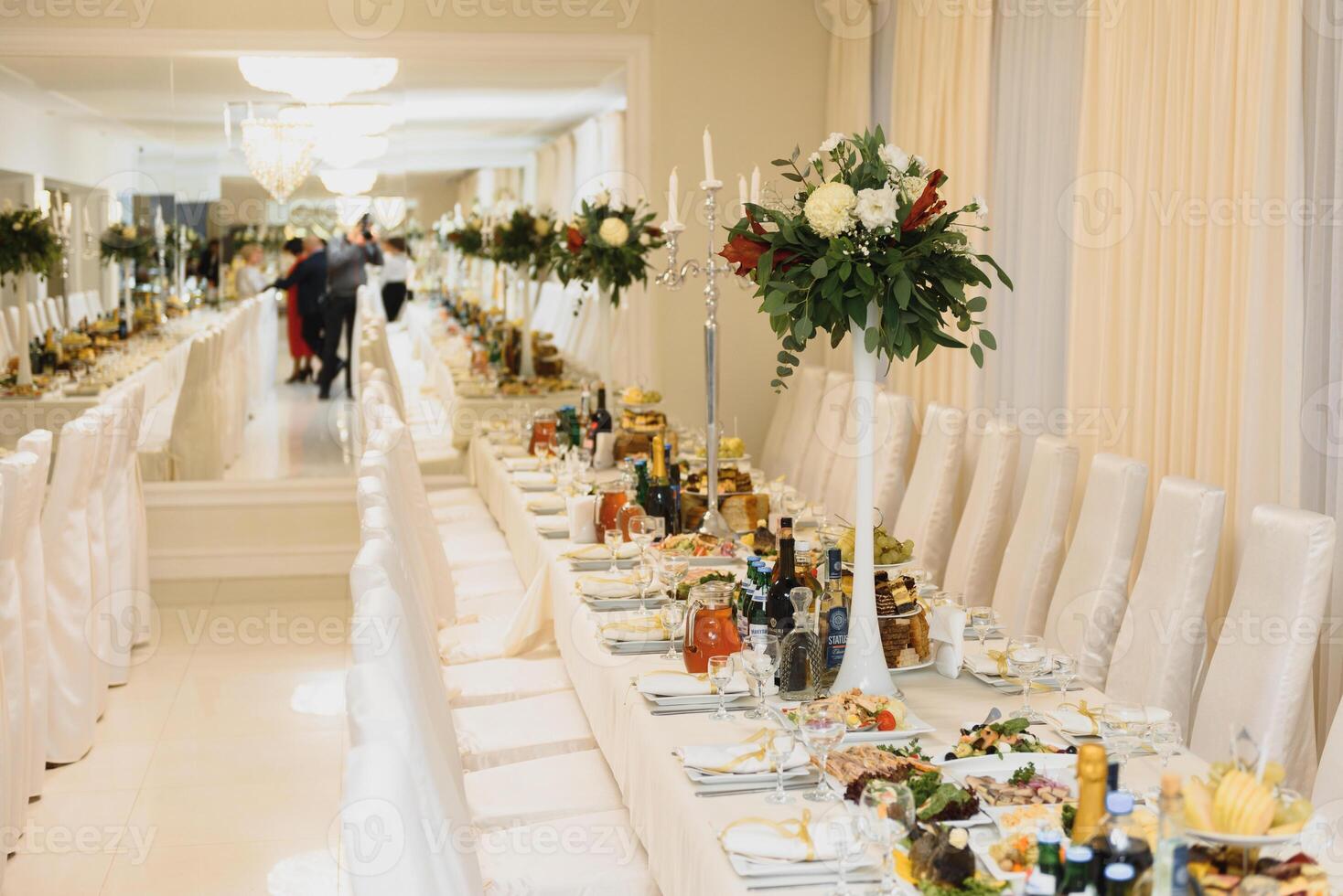 an image of tables setting at a luxury wedding hall photo