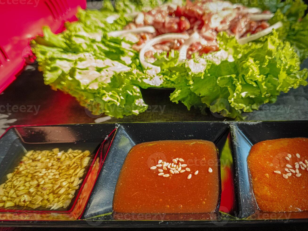 chili sauce or complementary spices for serving Korean-style grilled meat photo