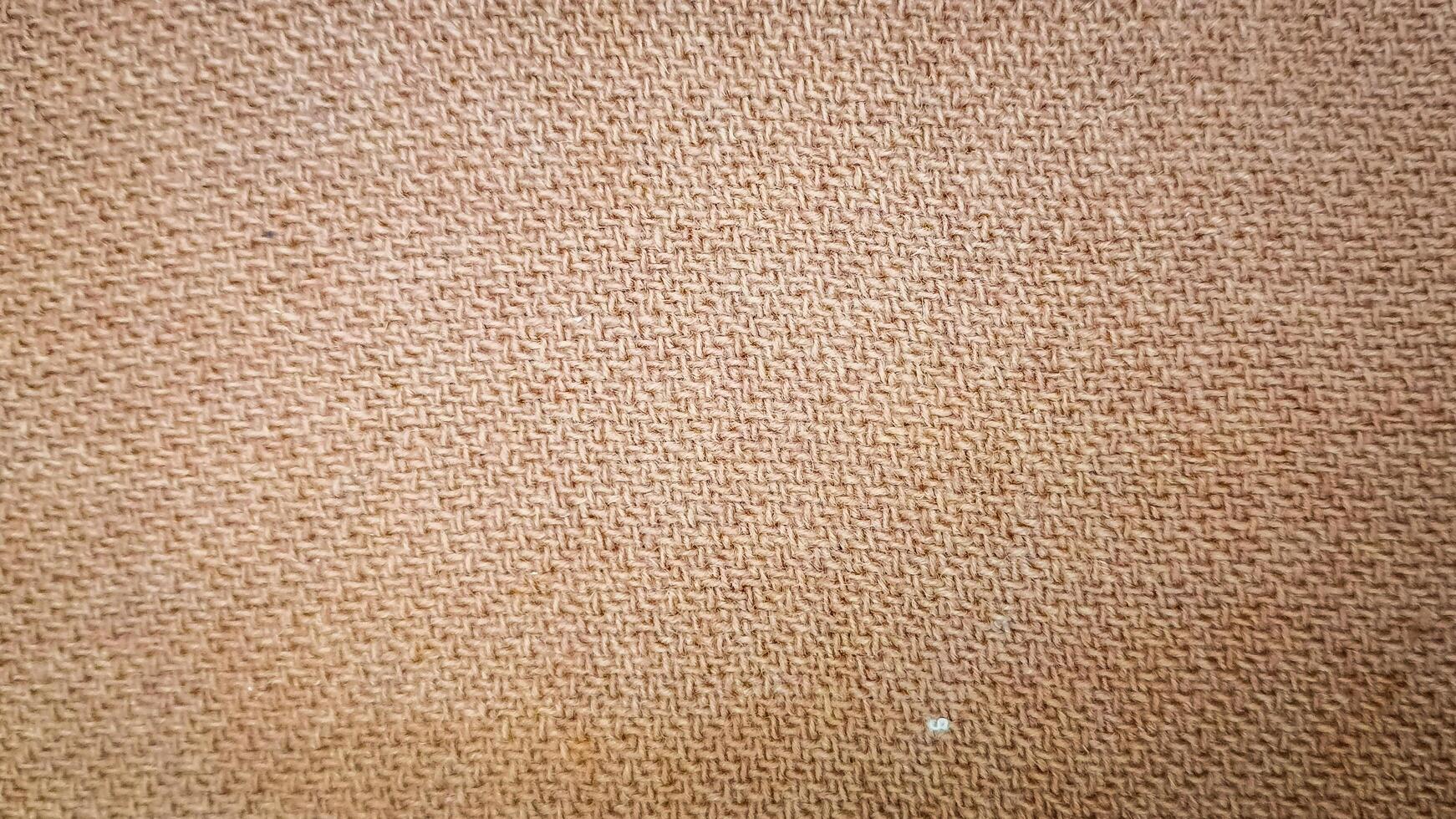 The rough texture of the burlap sack material seen up close photo
